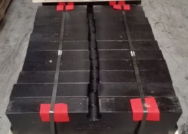 La arena verde echó los pequeños contrapesos para la carretilla elevadora con la pintura del final