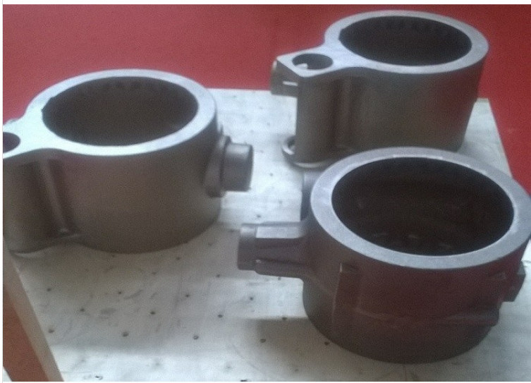 OEM de alta calidad hierro fundido de arena con exactitud de las dimensiones de la cabeza del motor piezas de fundición con pintura de acabado