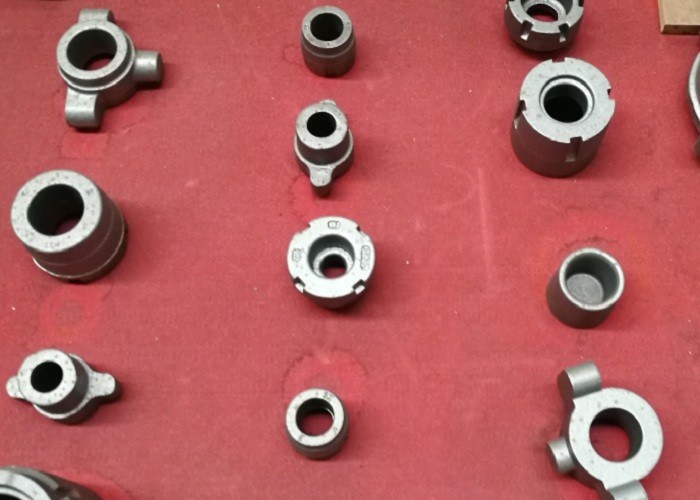 Piezas metálicas pequeñas de hierro fundido de alta calidad OEM FC250 GG25 HT250 para orugas de montacargas
